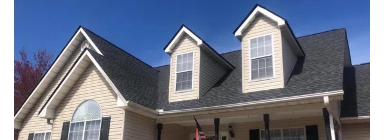 Finished shingle roof with dormers on a home in middle Georgia